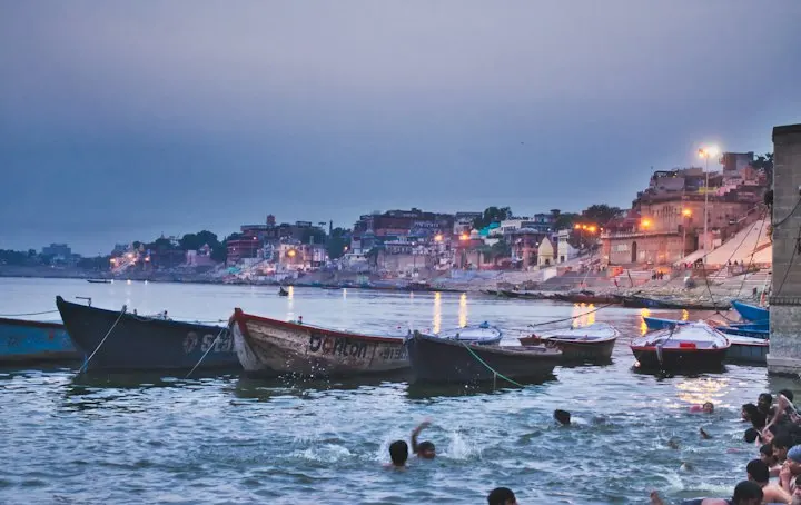 Rowing boats near dock: Varanasi and Ayodhya holiday packages by OYG Holidays